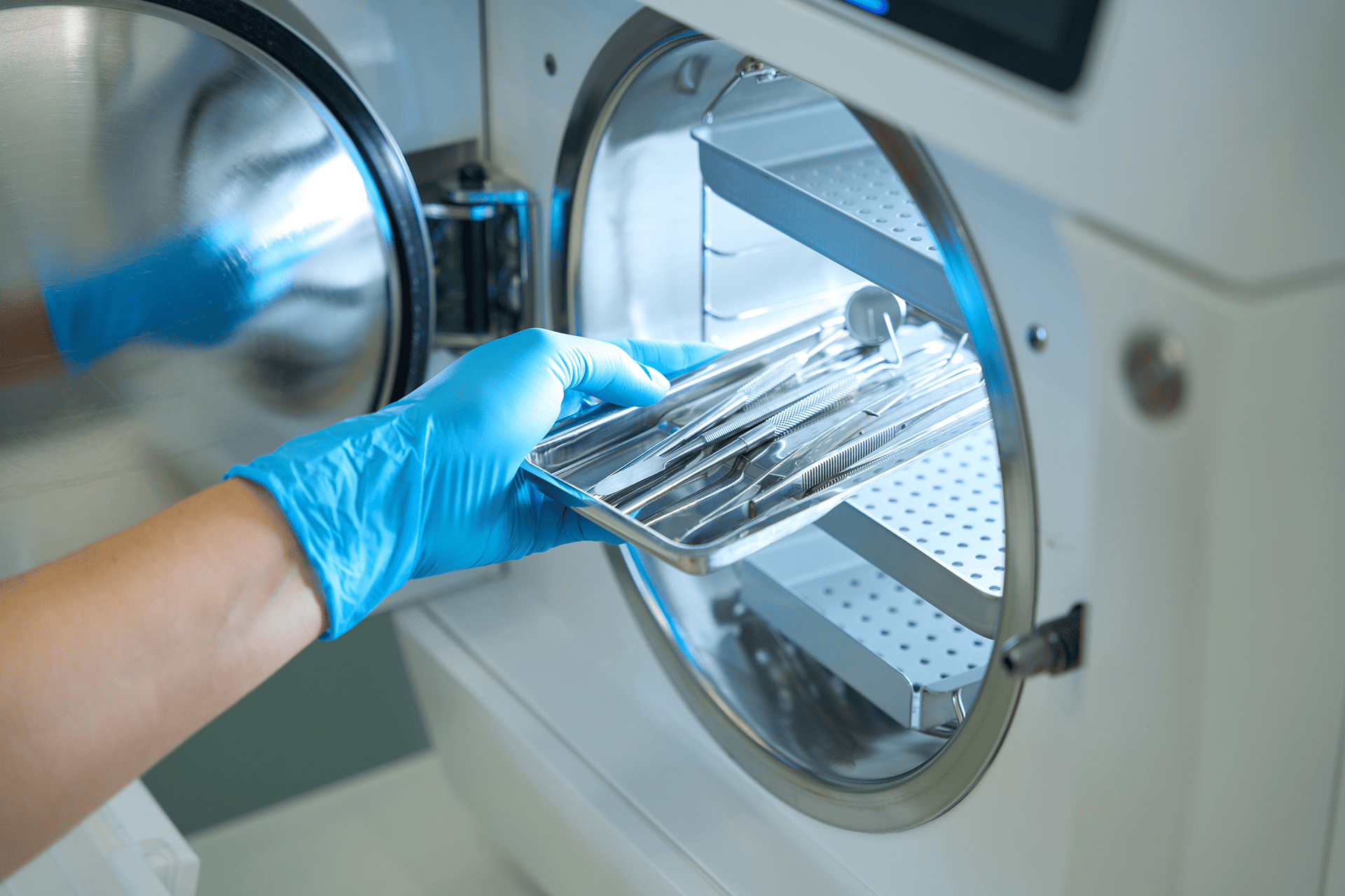 Sterile services technician preparing surgical instruments